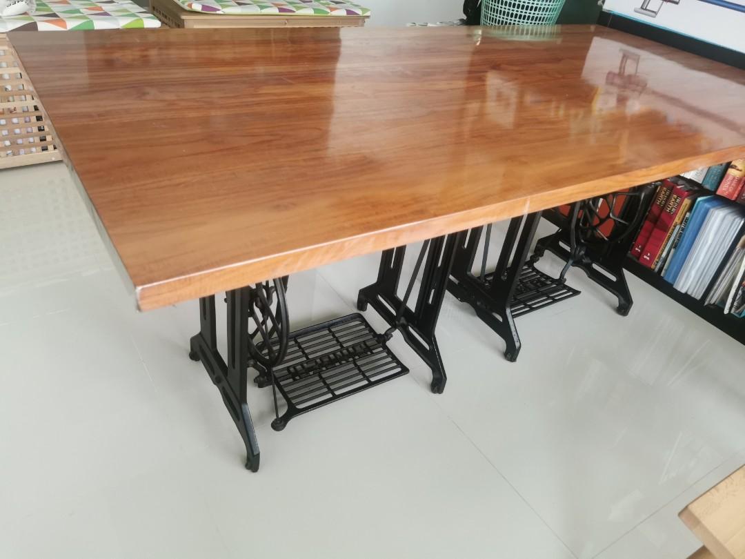 Dining table (Category: Tables & Sets) located in Singapore. Submitted by moderndaygypsies (Listing ID 1048052810, Image 3). Description: Customed made dining table from Second Charm. Solid teak wood table top. Dimension : Length x width x height 180cm x 89cm x 75cm Vintage singer sewing machine legs. Table, chairs, dining, bench, living room, kitchen, old school, ol skool, vintage, old table, solid table, teak.