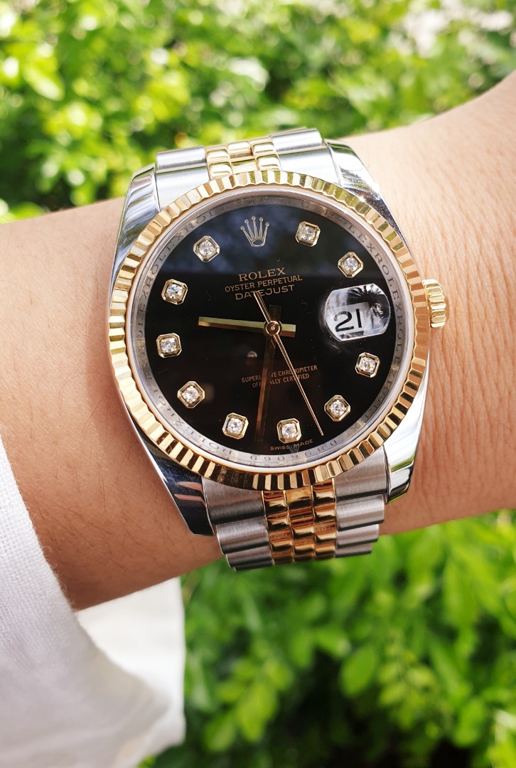 Two tone top rolex black face