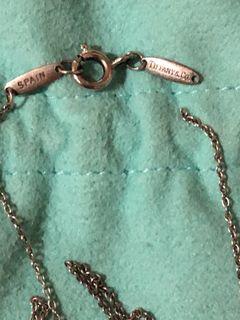 Tiffany & Co. cross pendant necklace