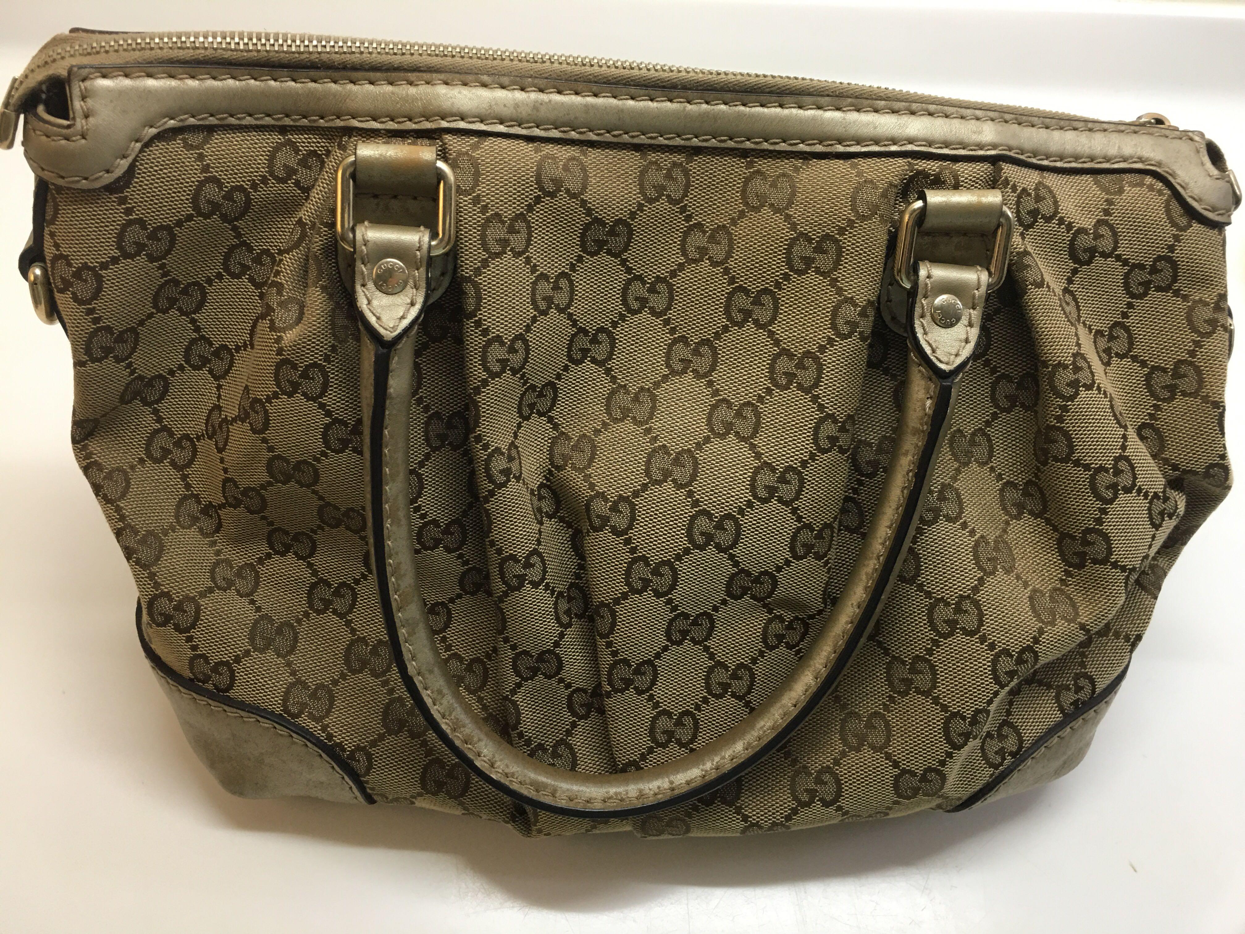 Authentic Gucci (Category: Bags & Wallets) located in Singapore. Submitted by susy2020 (Listing ID 1048366809, Image 2). Description: Original Gucci handbag Good condition Some part of leather slightly discoloured due to seldom use.