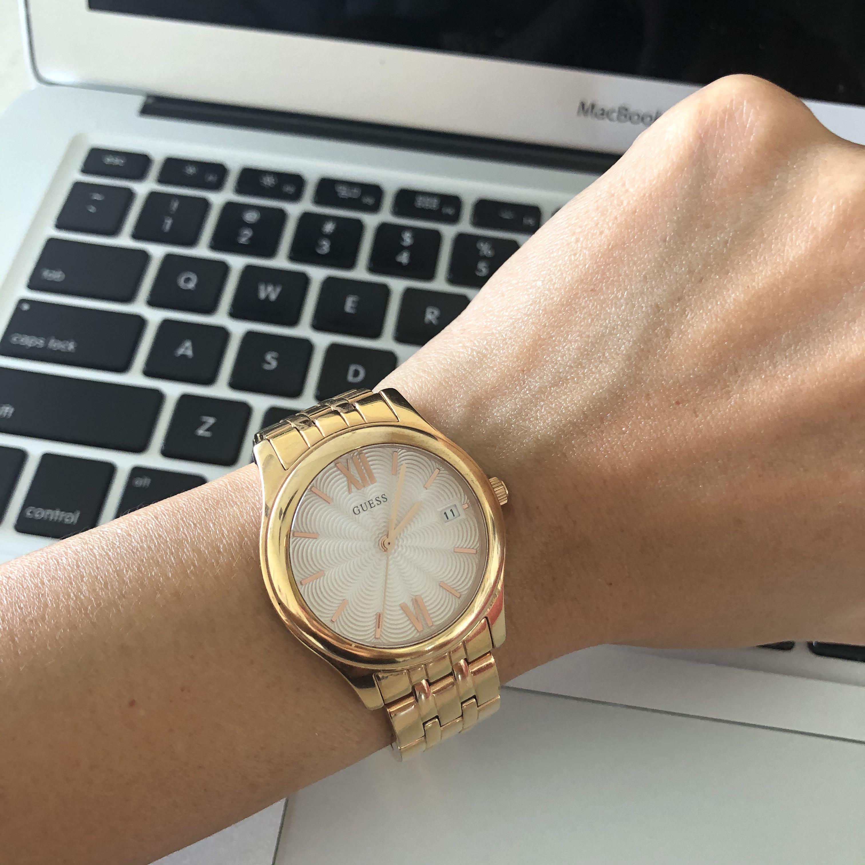 Gold tone bracelet top watch