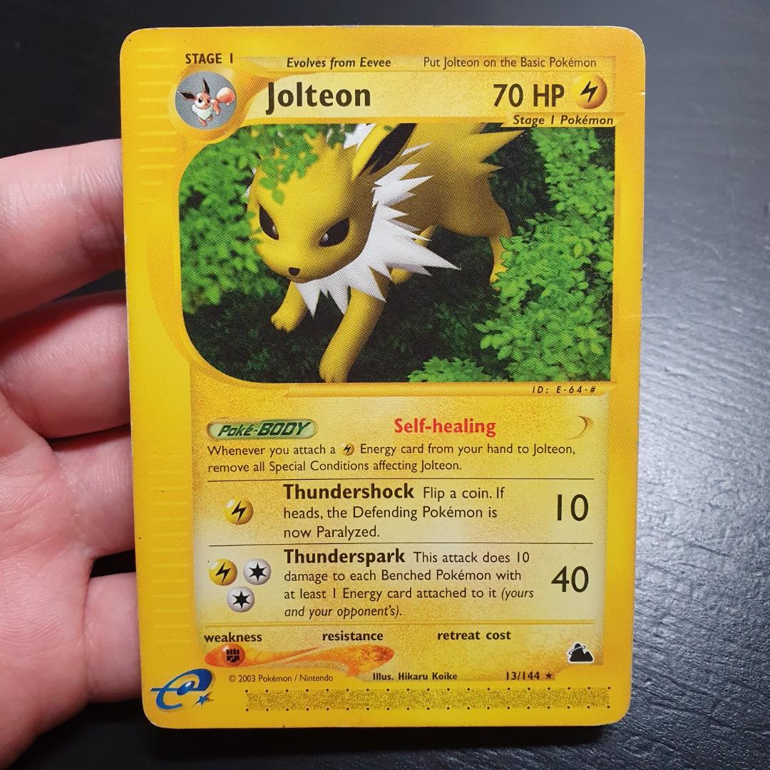 jolteon pokemon card value 4/64 Amazon.com: Pokemon Singles - Jolteon - 4/64 - Holo Rare - Unlimited  Edition main image 1
