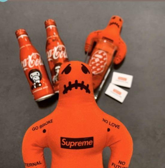 supreme voodoo doll red