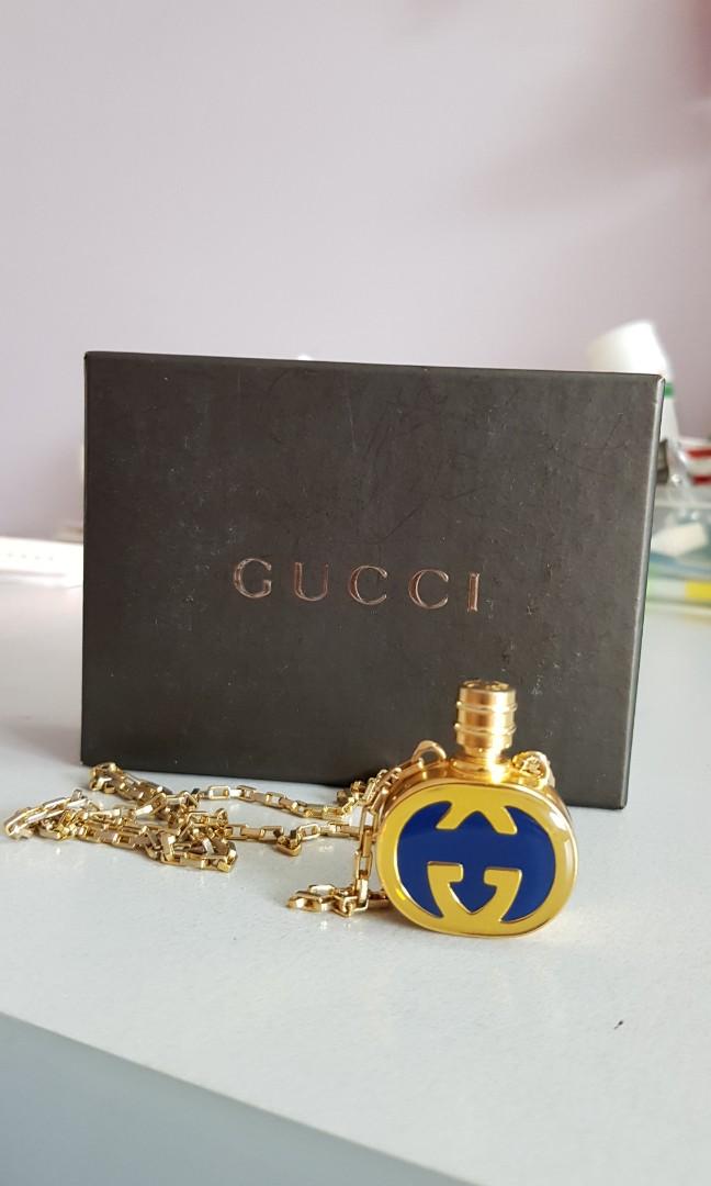 Gucci perfume discount bottle necklace