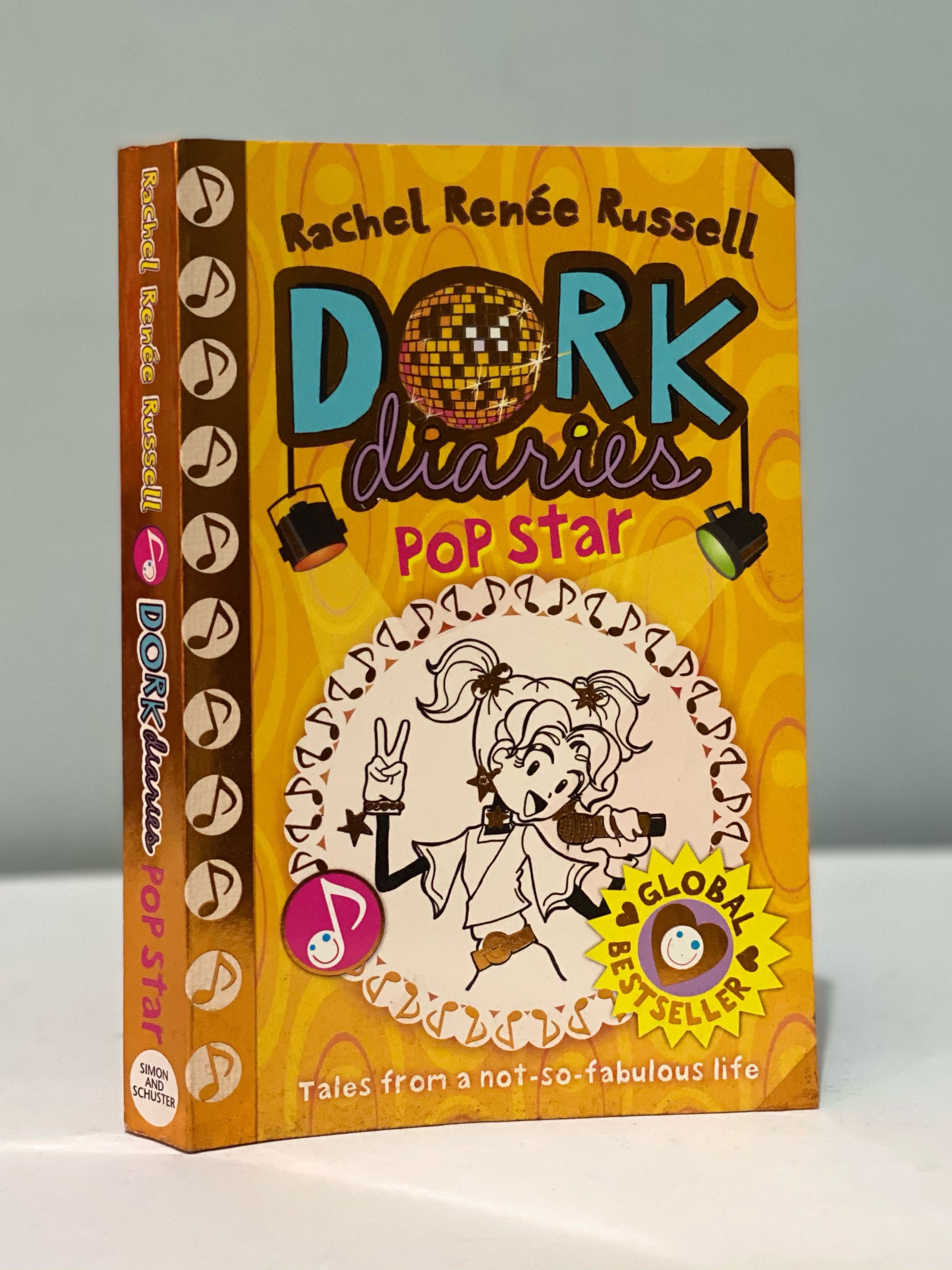 Dork Diaries - Pop Star (Category: Children's Books) located in Taguig. Submitted by pleasebuymystuff27 (Listing ID 1048561590, Image 1). Description: Dork Diaries: Pop Star by Rachel Renee Russell (Author) Regular Price: 395.00 PAPERBACK Let the spotlight showdown commence... Nikki Maxwell's school is holding a talent competition and Nikki can't wait to start practising dance moves with her BFFs, Chloe and Zoey, and impressing Brandon, her crush