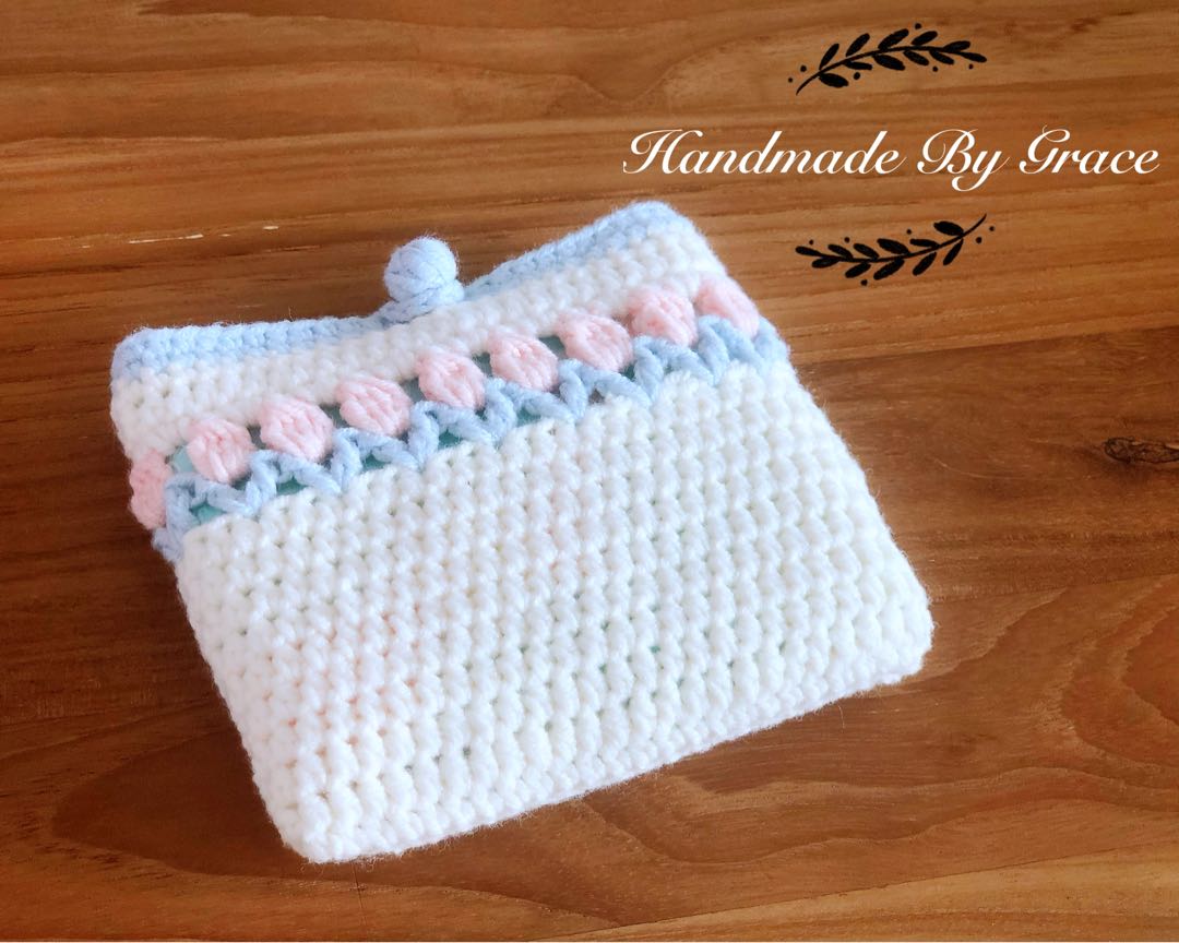 Sanitary pad outlet holder pouch