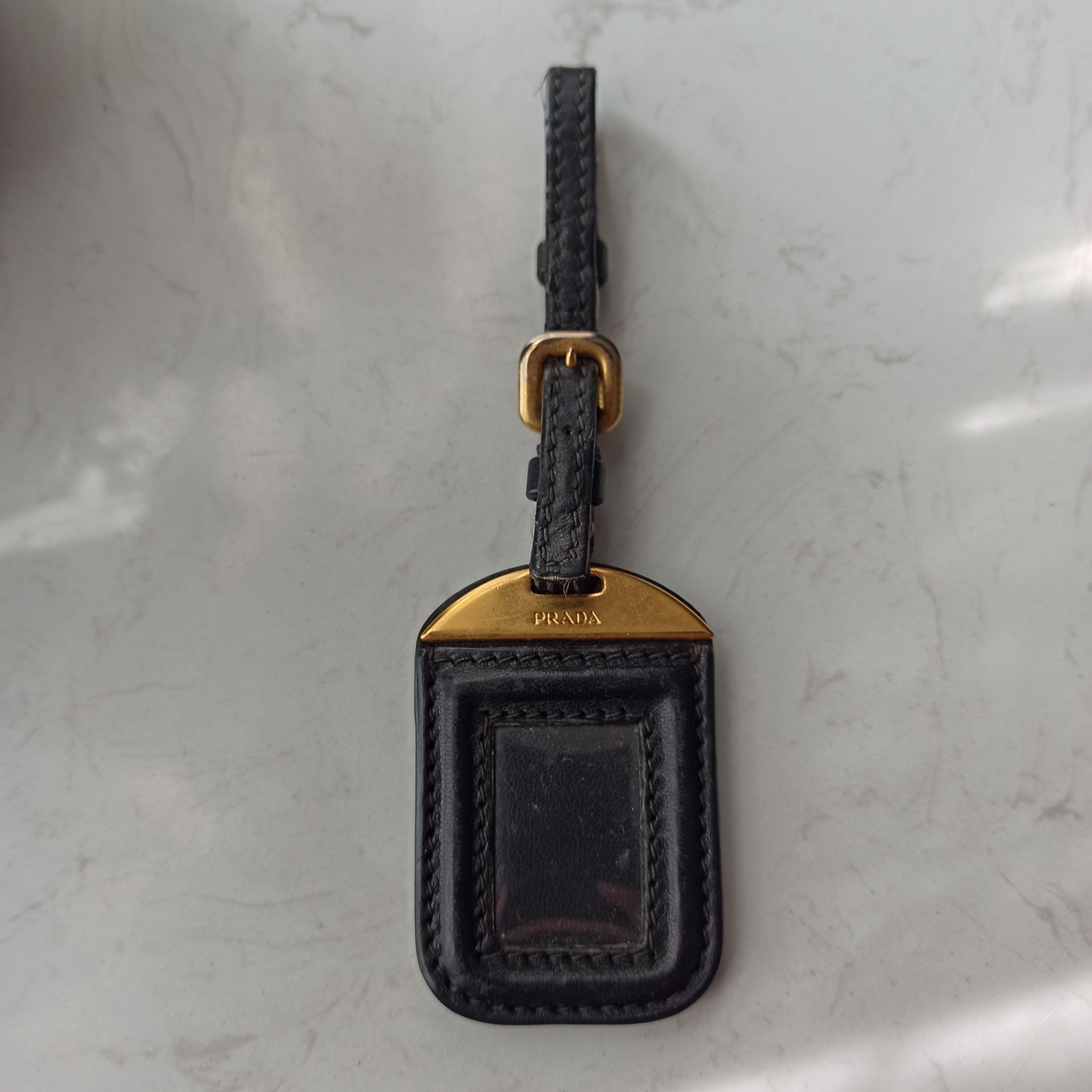 prada bag tag