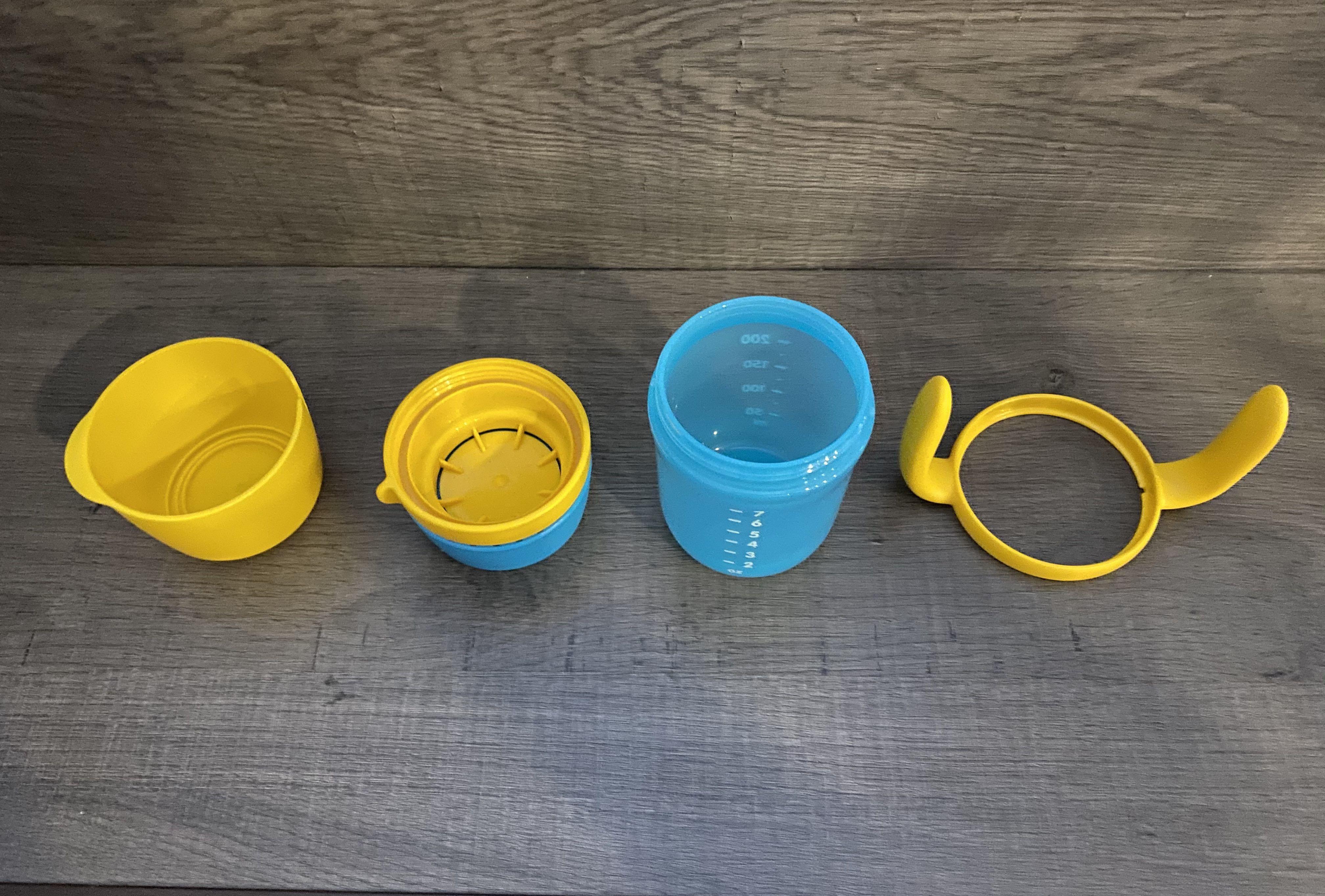 Preloved Tupperware Baby Training Sipping Drinking Bottle With Cup With Handle Babies Kids Nursing Feeding On Carousell