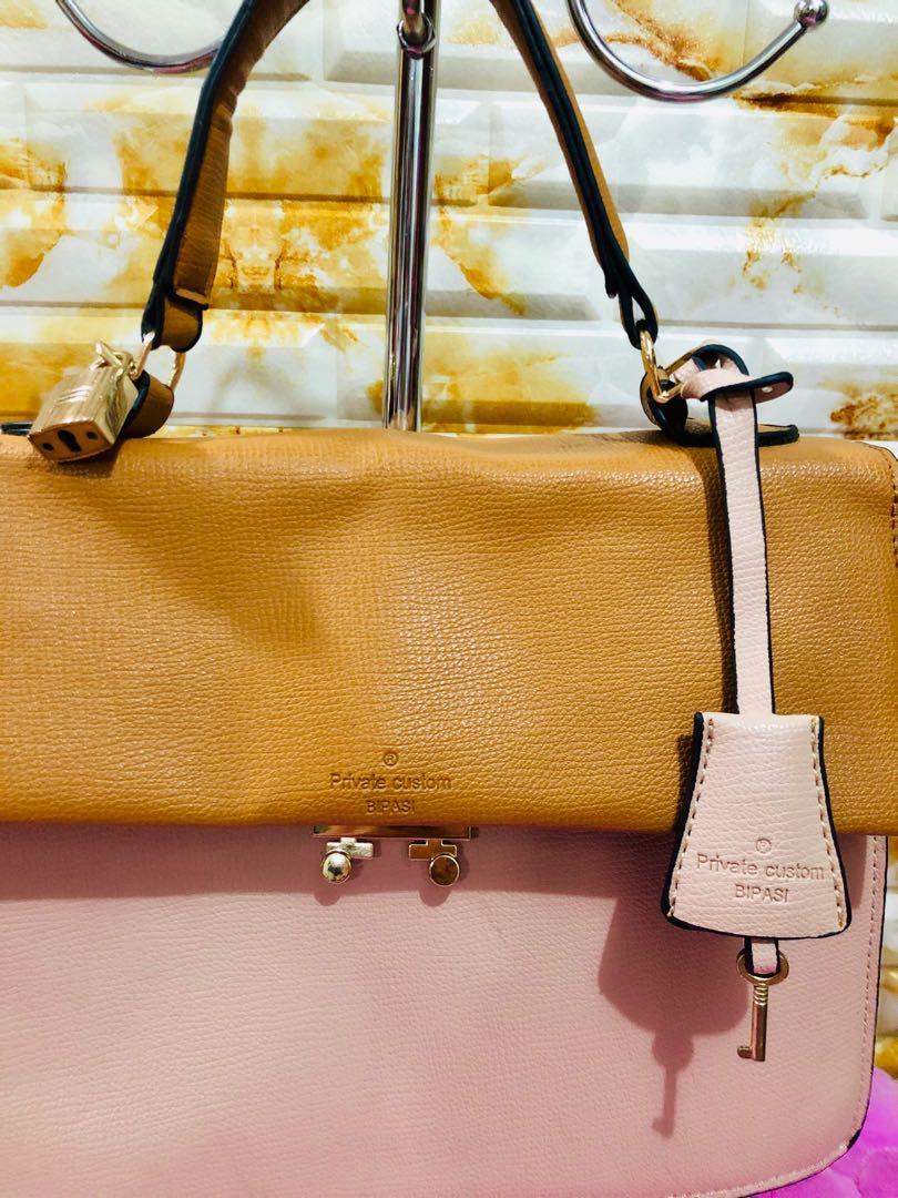 Bipasi - customized bag (Category: Purses & Pouches) located in Binan City. Submitted by angel03deguzman (Listing ID 1048881898, Image 2). Description: -This bag is a customized bag which I bought in Korea, so there's only one of this style/kind of bag in the world. -In very good condition. -with lock and key .