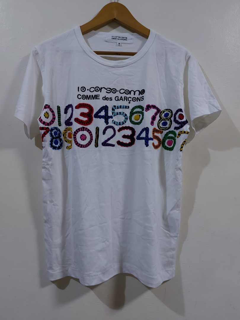 Comme des Garcons 10 Corso Como T shirt Men s Fashion Tops
