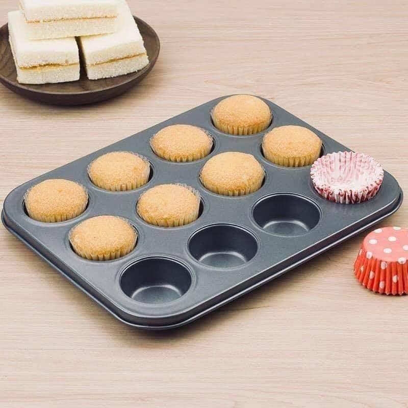 Cookies Mold Pan (Category: Bakeware) located in Taguig. Submitted by i_am_blessygrei (Listing ID 1048857784, Image 3). Description: 🔸️ Non-stick Cookies Mould Pan ▪️size: 14x10 inches ▪️12 slot/cups For Pickup only.