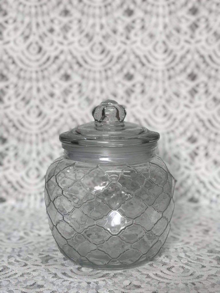 Glass Container / Cookie Jar (Category: Storage Boxes & Baskets) located in Paranaque City. Submitted by vintagesoulmanila (Listing ID 1048980670, Image 1). Description: Measurements: *Diameter - 4 inches *Height - 5 inches (without lid) *Height - 7 inches (including tip of the lid).
