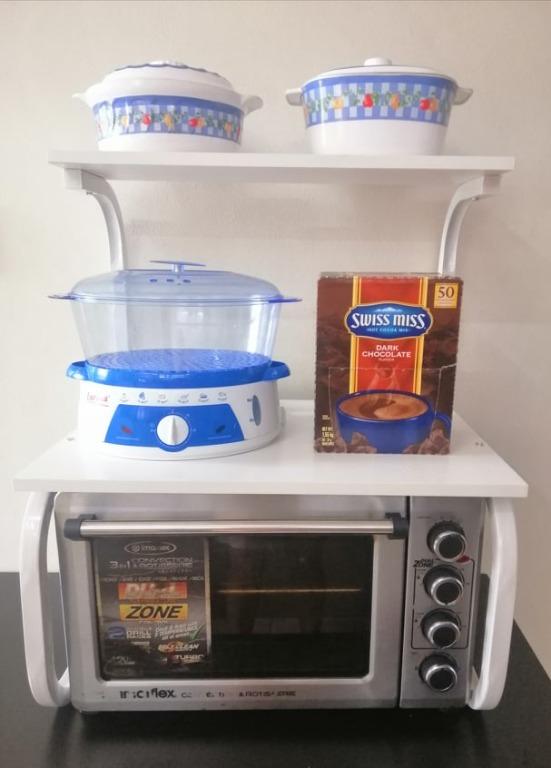 Kitchen Organizer Rack For Microwave Oven Storage 3 Layer Heavy Duty (Category: Food Organization & Storage) located in Malabon City. Submitted by susan.maroga (Listing ID 1048881629, Image 1). Description: Space Saver Kitchen Shelf : Board thickness 1.6cm : 20mm x 20mm Square Tube Plate : E1 Class Eco- Friendly Wooden Material : Size 60cm x 40cm x 75cm .