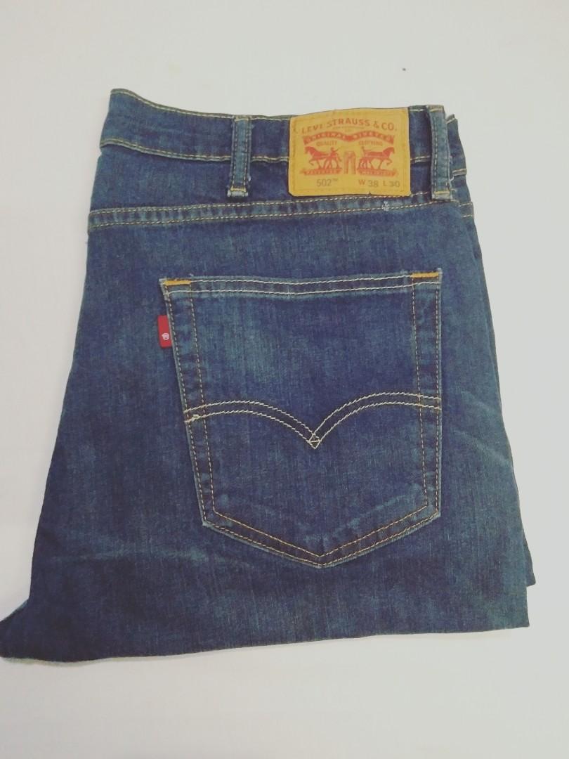 Levi's 502 Regular Taper Blank Red Tab only R Jeans, Men's Fashion,  Bottoms, Jeans on Carousell