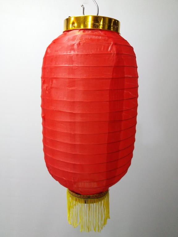 Oval Cloth Tussel Lantern (Category: Laundry Baskets) located in Manila. Submitted by aaronmerchandise (Listing ID 1048901668, Image 1). Description: 8 inch : Price : P 95 10 inch : Price : P 120 12 inch : Price : P 150 Available color : Red, Yellow, Orange, Green.