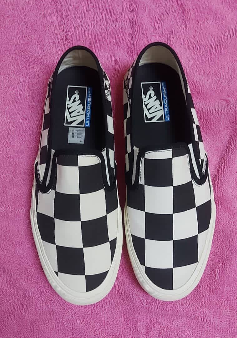 Mega checkered slip ons best sale