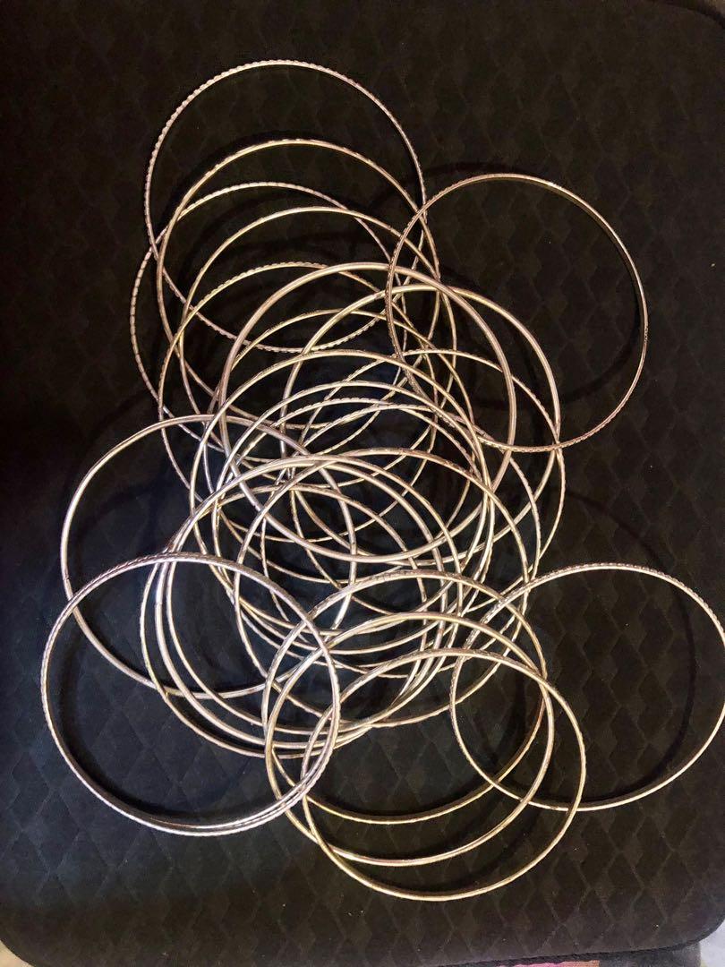 25-pcs silver bangles set (Category: Bracelets) located in Mandaluyong City. Submitted by ccshoppes (Listing ID 1049213042, Image 1). Description: Unused and in perfect condition MOP: BDO/BPI Shipping via Grab/Lalamove from Mandaluyong.