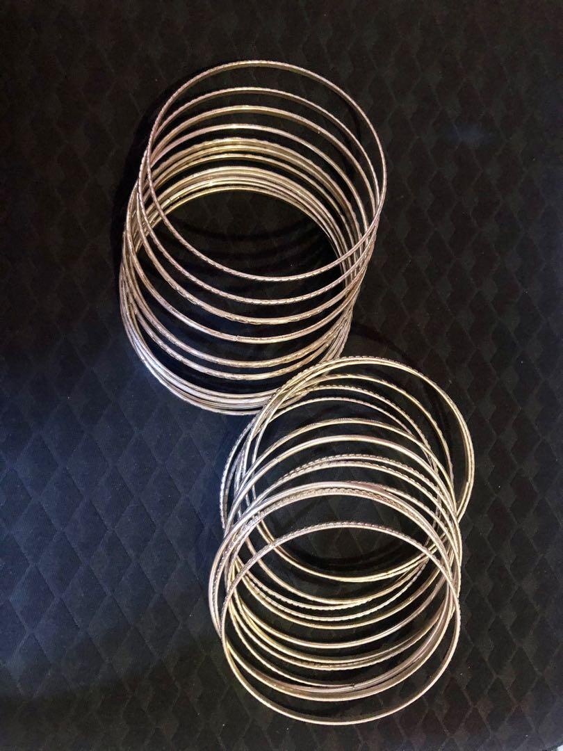 25-pcs silver bangles set (Category: Bracelets) located in Mandaluyong City. Submitted by ccshoppes (Listing ID 1049213042, Image 2). Description: Unused and in perfect condition MOP: BDO/BPI Shipping via Grab/Lalamove from Mandaluyong.