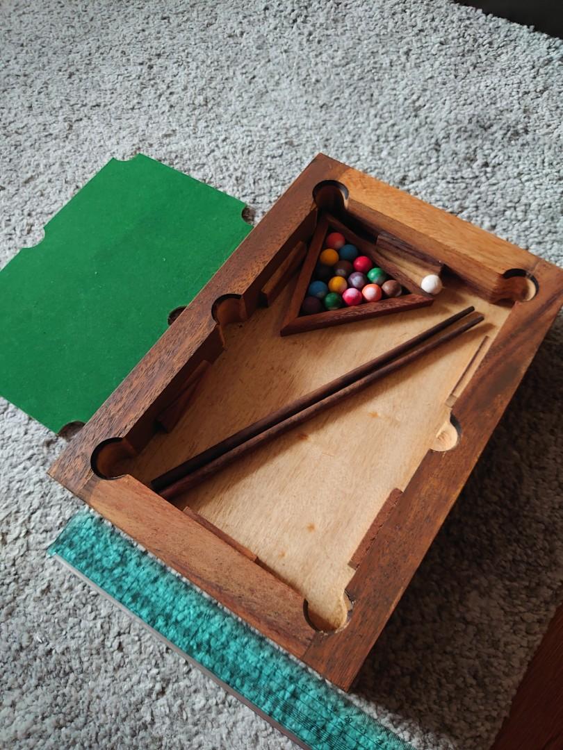 Mini Pool Table (Category: Billiards & Bowling) located in Singapore. Submitted by pewed (Listing ID 1049124853, Image 1). Description: Made of walnut wood size: 20 x 29.3 x 6.5cm complete set pretty much brand new.