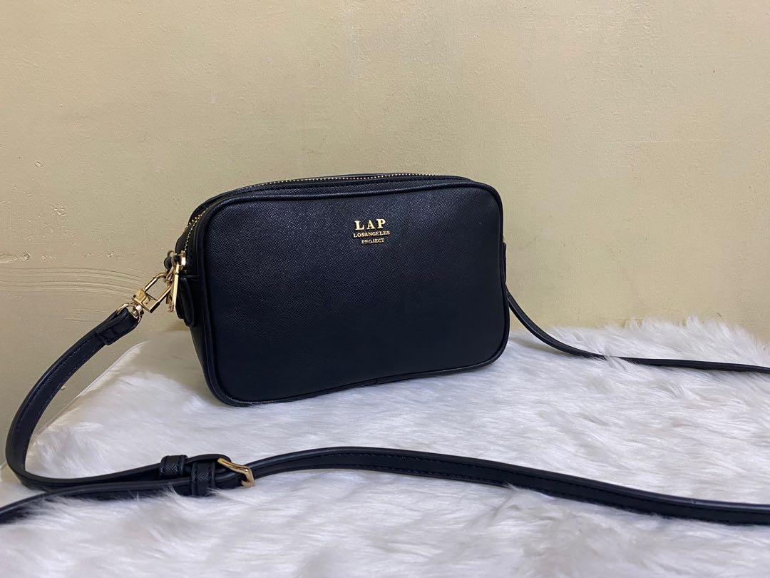 Lap sling outlet bag