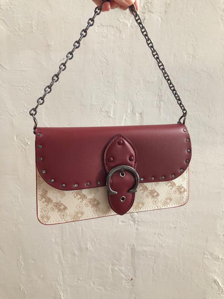 beat crossbody clutch in signature canvas with horse and carriage print