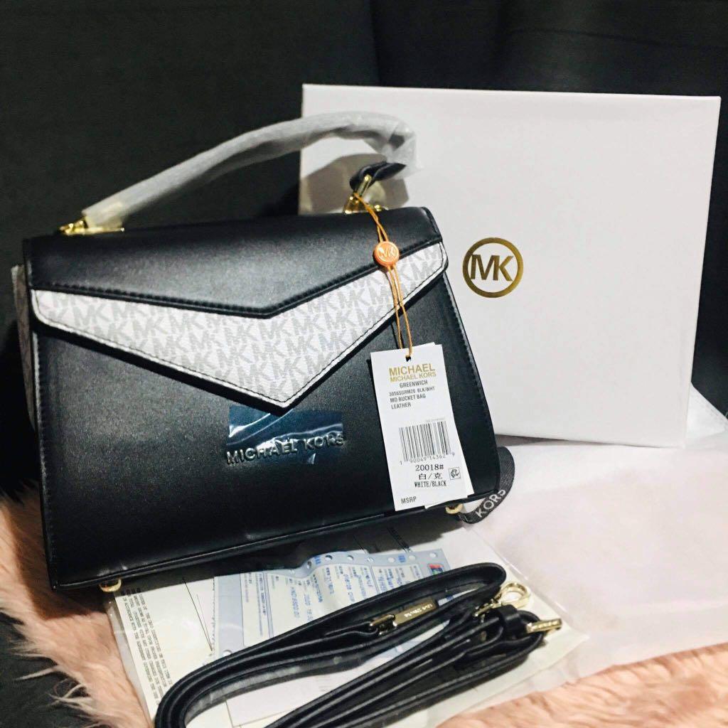 Michael Kors Bag | MK Bag (Category: Luxury Bags & Wallets) located in Manila. Submitted by dsposable (Listing ID 1049645555, Image 1). Description: Complete Inclusion -Dust Bag -Receipt -Sling -Card.
