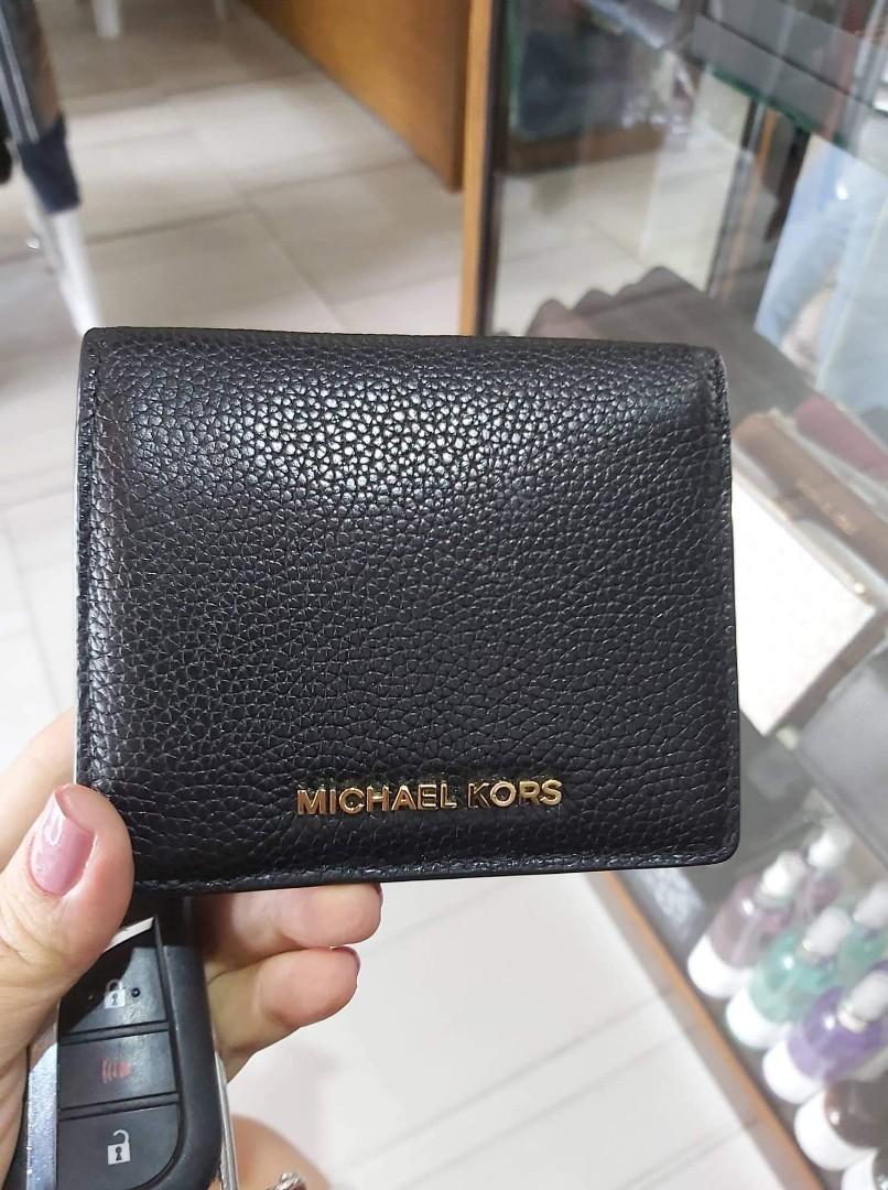 Michael Kors Jet Set Travel Carryall Leather Small Bifold Wallet, Women's  Fashion, Bags & Wallets, Wallets & Card holders on Carousell