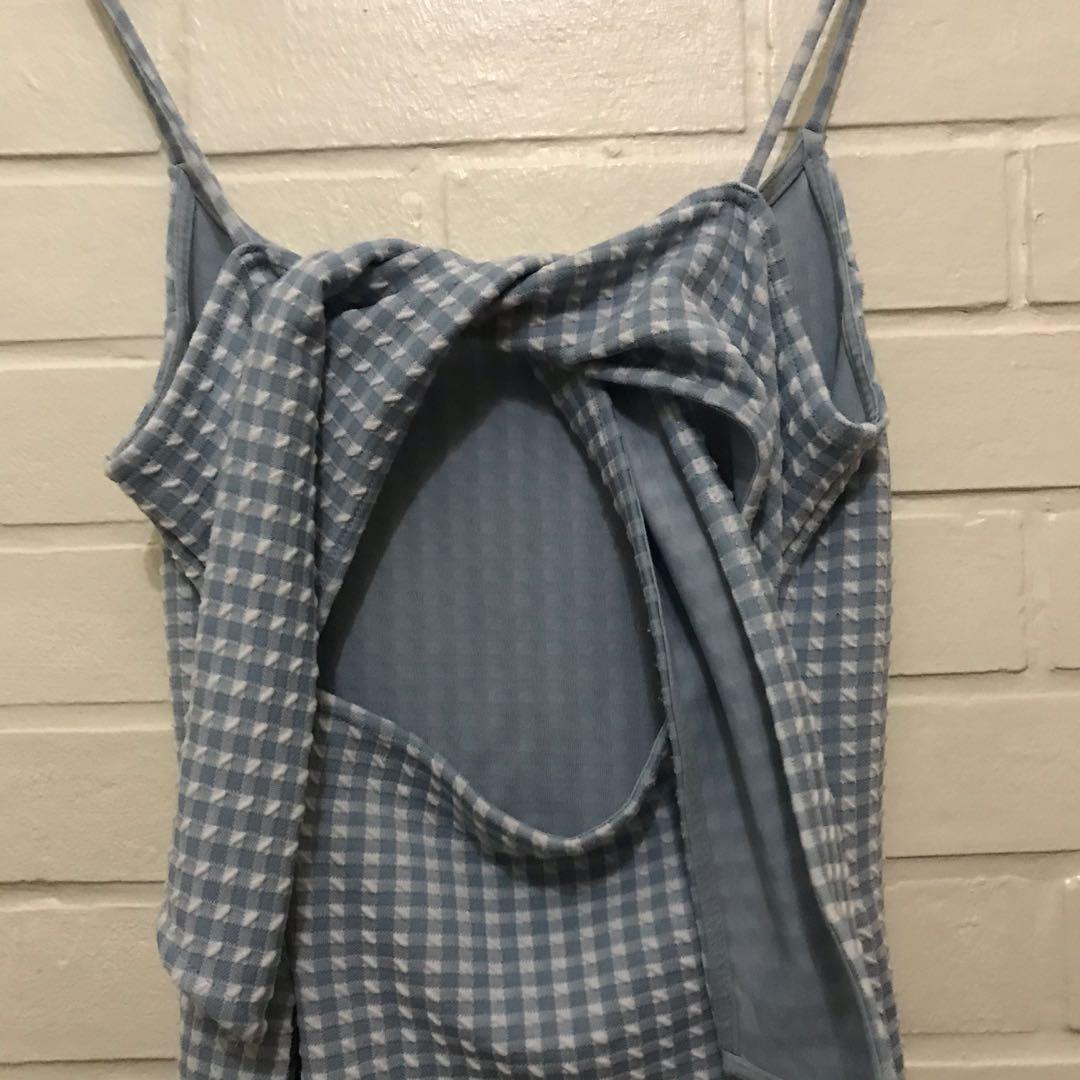 TOPSHOP Light Blue Gingham Dress (Category: Dresses) located in Quezon City. Submitted by abbycries (Listing ID 1049631129, Image 3). Description: super flattering, ties at the back (3rd pic) pm for pic when worn nationwide shipping, shouldered by buyer 100% of sales will be donated to fundraisers for victims of Typhoon Ulysses.