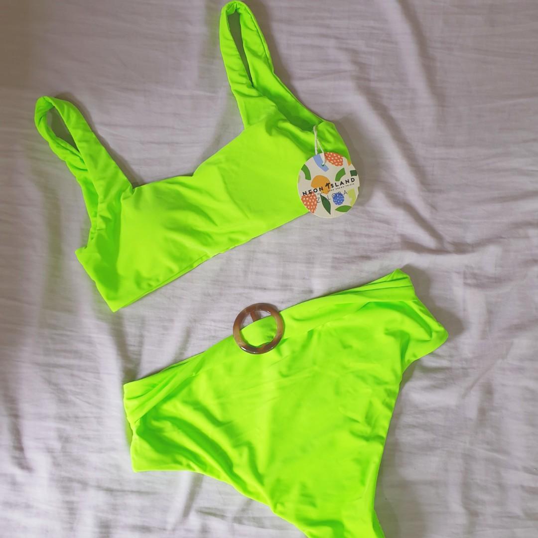Neon Island Two Piece Swimsuit (Category: Bikinis & Swimsuits) located in Manila. Submitted by mrldny (Listing ID 1049798880, Image 1). Description: Original Price: P1995 Size: M (Bust: 35" Waist: 29" Hips: 38") Never worn, includes brand tag! This neon green looks really cute :) RFS: Bought the wrong size.