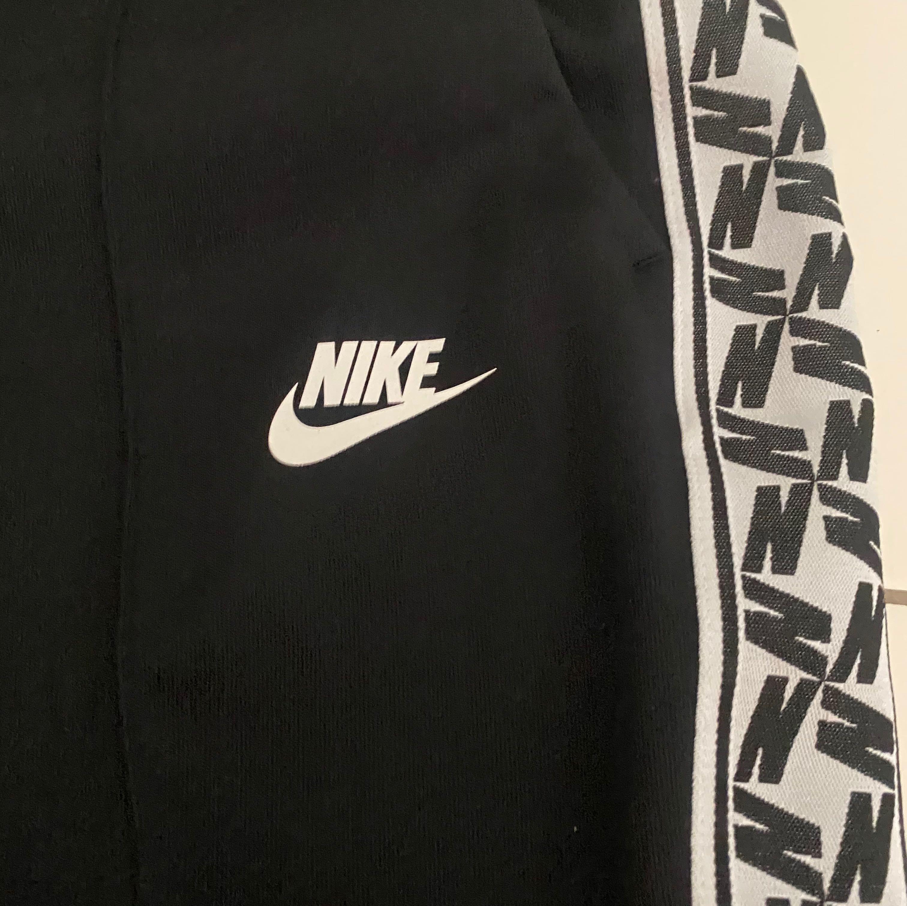 Nike taped poly track pants outlet