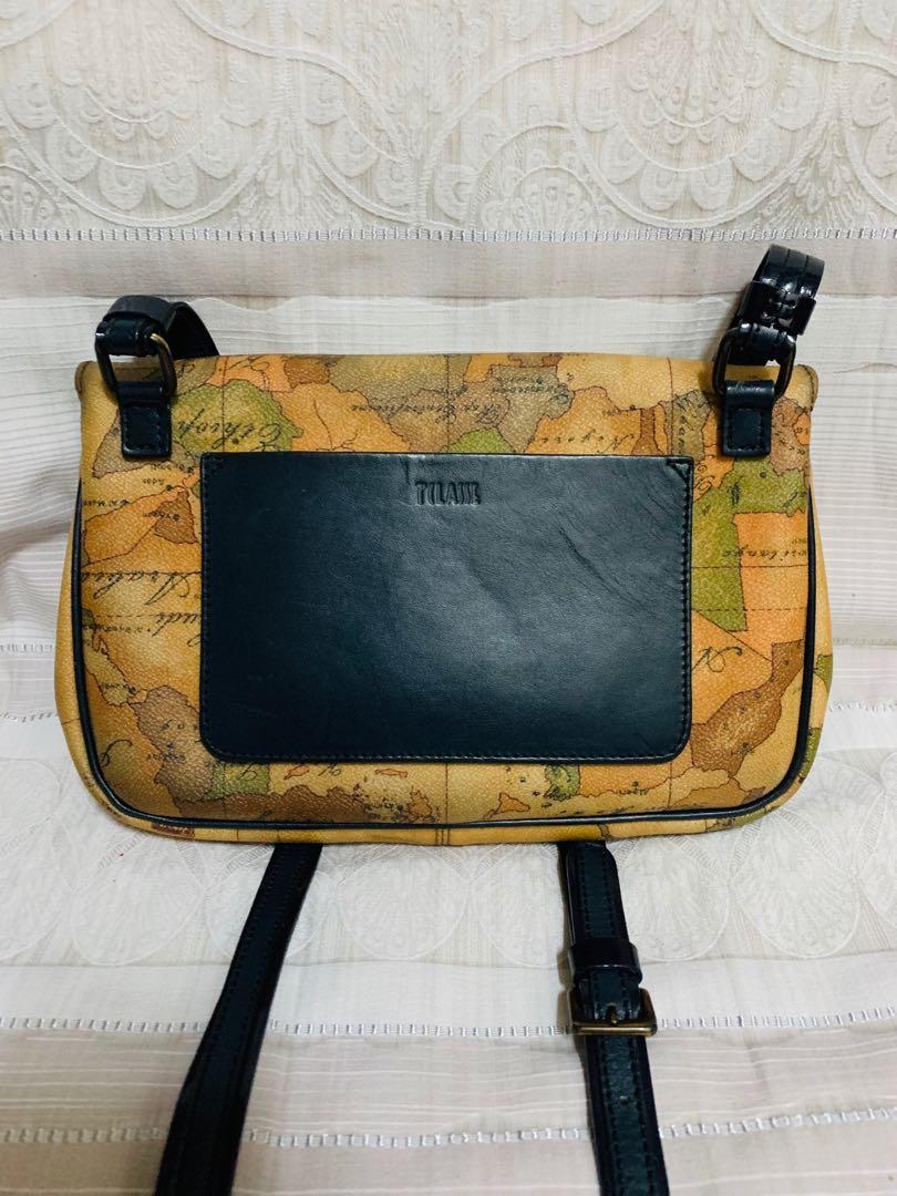 Authentic Alviero Martini Sling bag (Category: Luxury Bags & Wallets) located in Manila. Submitted by authentic.holdalls_88 (Listing ID 1050130295, Image 2). Description: Guaranteed authentic no cracks no rubs, minor flaw -color transfer .