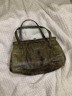 Green snakeskin leather handbag with top clasp