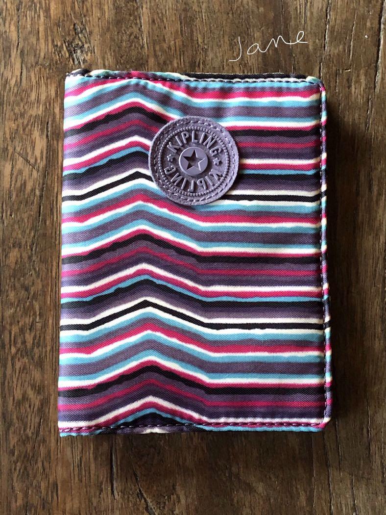 Kipling hot sale passport wallet
