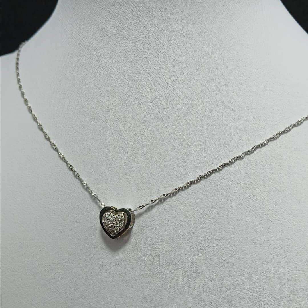 🌼Heart solitaire necklace🌼 (Category: Necklaces) located in Quezon City. Submitted by hellobuyeverything (Listing ID 1046405376, Image 3). Description: ✅selling my 18K white gold Diamond Brills, Solitaire heart pendant necklace. 16" chain ✅Very dainty.