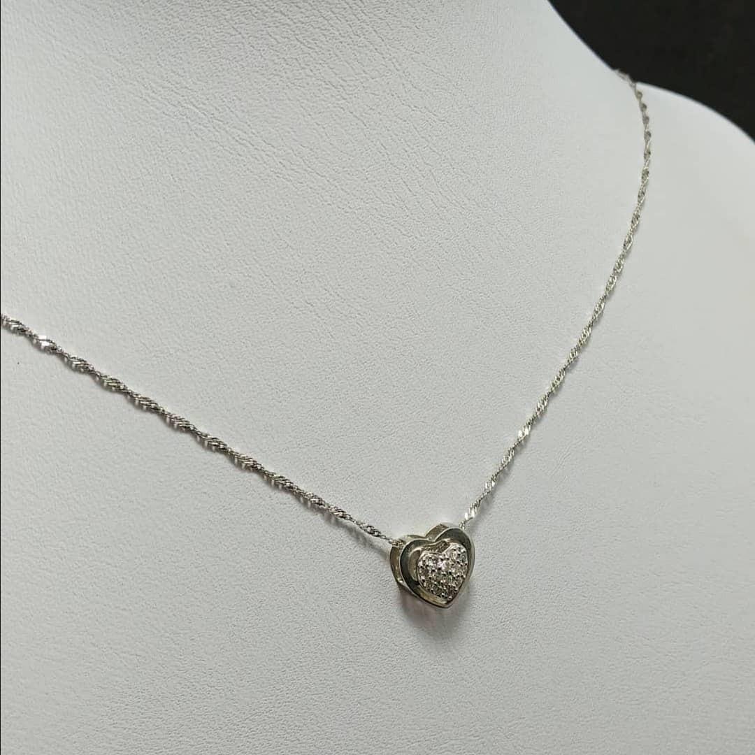 🌼Heart solitaire necklace🌼 (Category: Necklaces) located in Quezon City. Submitted by hellobuyeverything (Listing ID 1046405376, Image 2). Description: ✅selling my 18K white gold Diamond Brills, Solitaire heart pendant necklace. 16" chain ✅Very dainty.