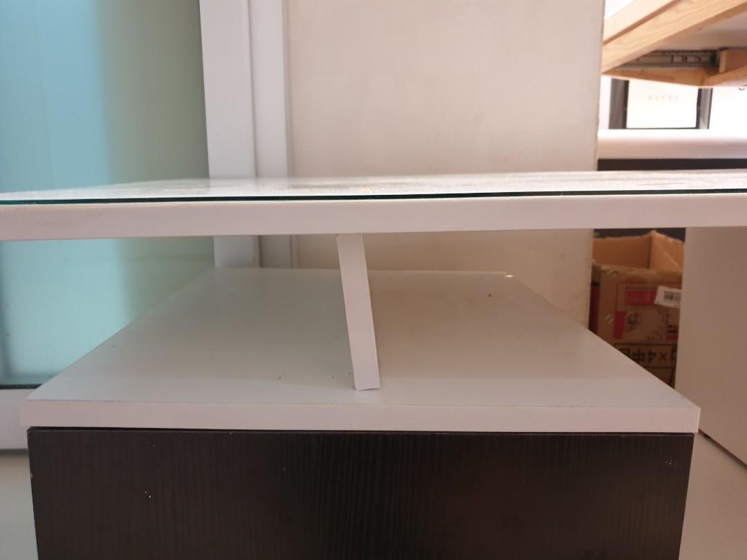 Tea table (Category: Tables & Sets) located in Singapore. Submitted by yyds35 (Listing ID 1046360695, Image 3). Description: Overall is in good condition. But it is a bit twist in picture 3, need to adjust the screw internally..