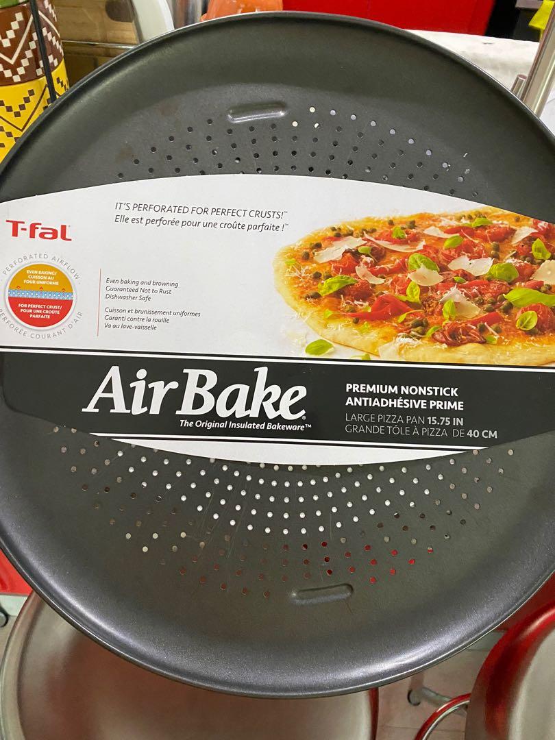 T-Fal Air Bake for Pizza (Category: Bakeware) located in Quezon City. Submitted by bigmommashoppe (Listing ID 1046262515, Image 1). Description: T-Fal Air Bake Premium Non Stick Large pizza pan 15.74 inch diameter Its perforated airflow for perfect crusts You will need a large oven for this baby Slight scratches .