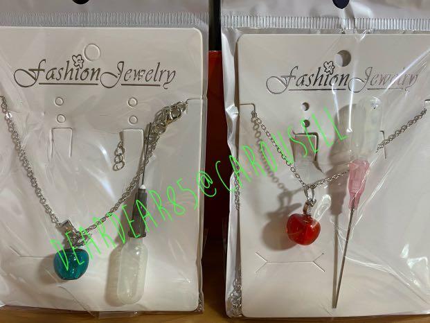 Diffuser necklace (Category: Necklaces) located in Singapore. Submitted by tieguanyin_sg (Listing ID 1050374359, Image 1). Description: You can pump perfume or essential oil into the apple with the syringe provided. 1 for $20 2 for $35.