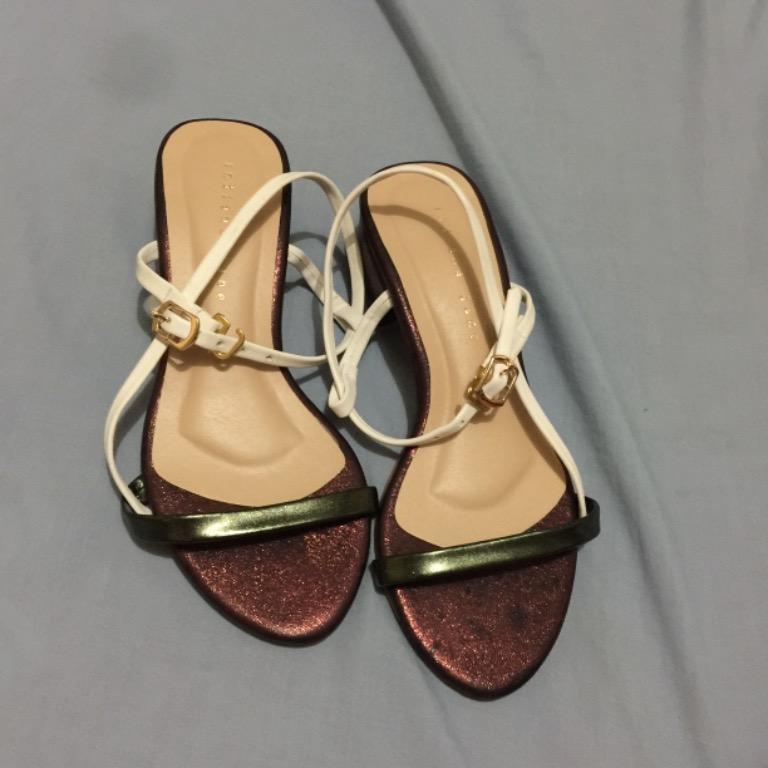 Glittery Strappy Heels Sandals Flats (Category: Flats & Sandals) located in Quezon City. Submitted by dindwan (Listing ID 1050348846, Image 2). Description: Size 5, No flaws, good as new just stored never used Tags: Adjustable Strappy straps 2 inches sandals flats heels open toe white straps black straps red glittered glitters shoes 2 inches .