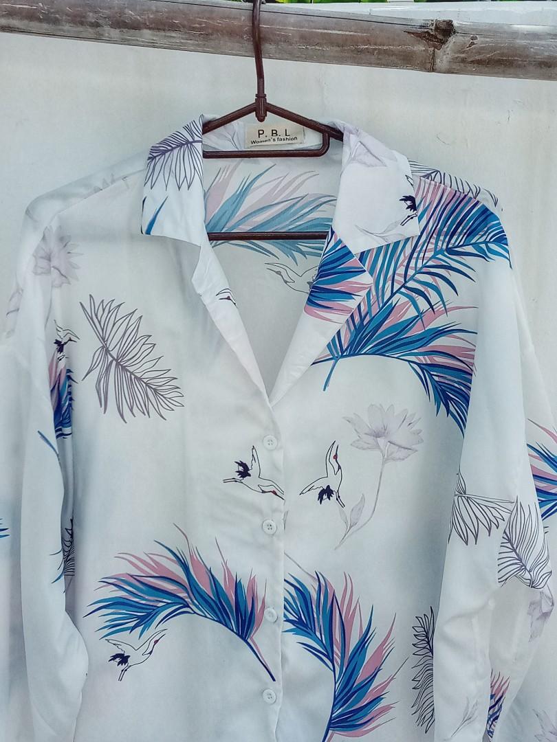 White printed longsleeve button down shirt (Category: Longsleeves) located in Quezon City. Submitted by gracebeejo (Listing ID 1050328945, Image 2). Description: °Fits S-L °Excellent condition °Please manage your expecrations. Most of the items are preloved MAXIMUM 2 DAYS RESERVATION ONLY 💸 Payment: GCASH/ BDO 📬 Shipping • NinjaVan •Grab & Lalamove.