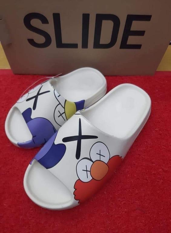 Kaws yeezy slippers best sale