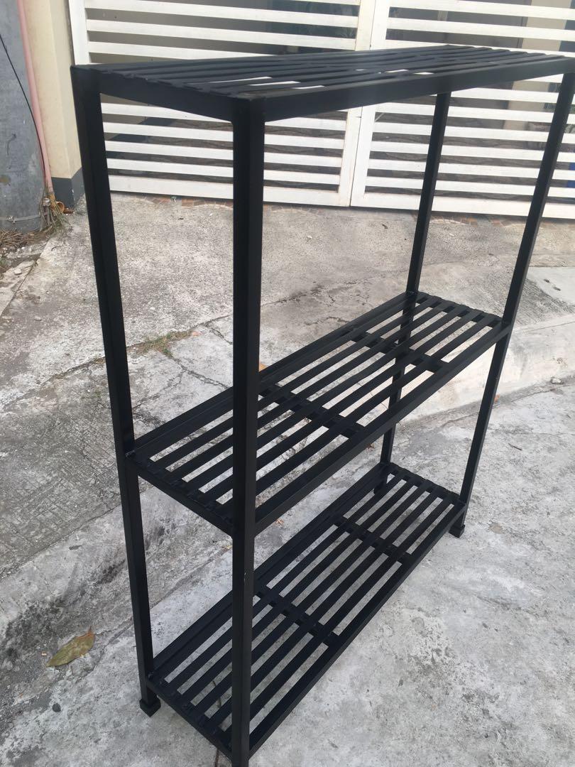 Plant Racks (Category: Gardening Tools & Ornaments) located in San Pedro. Submitted by draftingtablemaker (Listing ID 1050566375, Image 2). Description: 3-Layers Plant Racks Tubular Steel Metal 1x1inches with 1inch flatbar grill 52inches total heigh 12inches x 40inches (LW) spray painted gloss jet black finished.