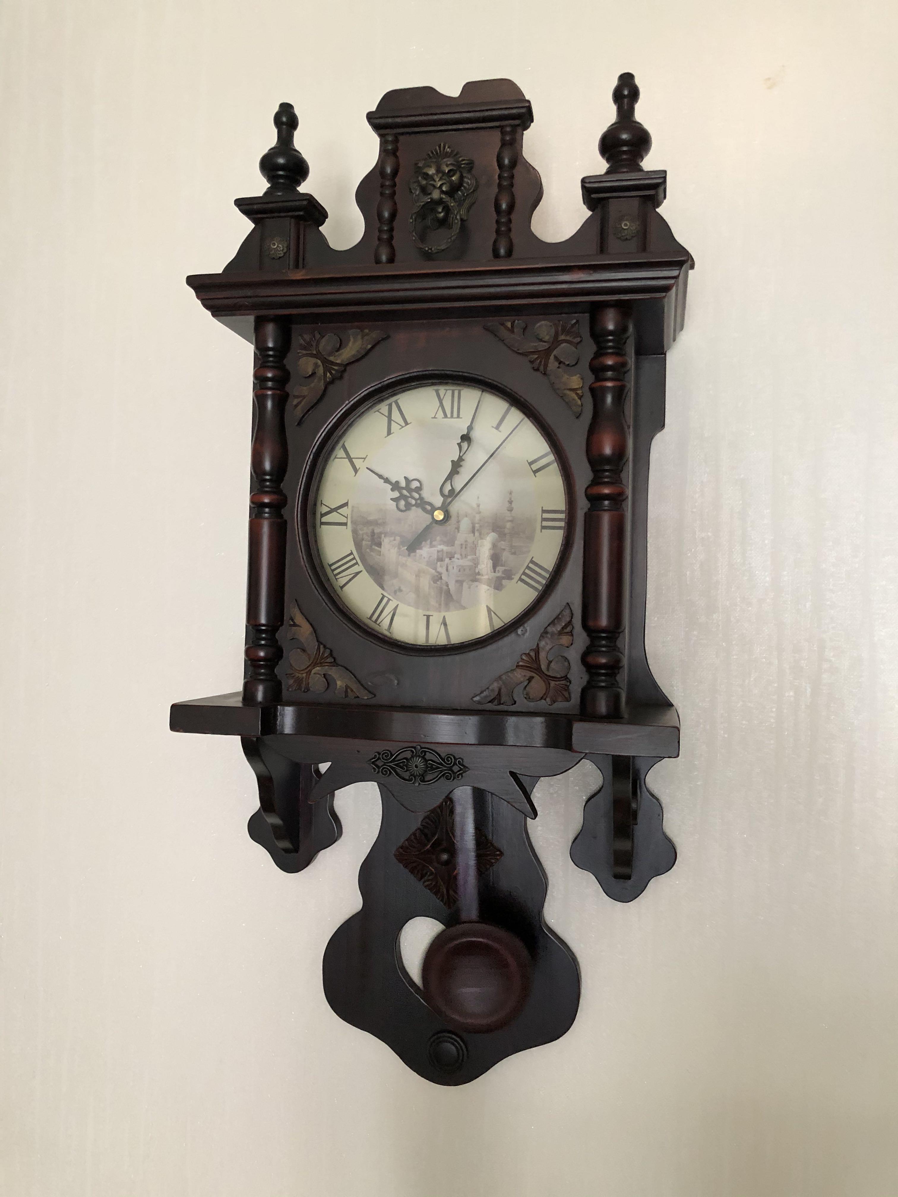 Wall Clock (Category: Clocks) located in Singapore. Submitted by buddyjan (Listing ID 1045178534, Image 1). Description: Wall-hang wooden, battery operated. Length 65cm Width 30cm Collect along woodlands ave 6.