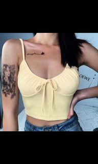 Yellow lace up tank
