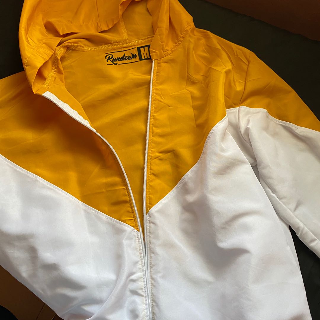 Yellow black and white windbreaker store
