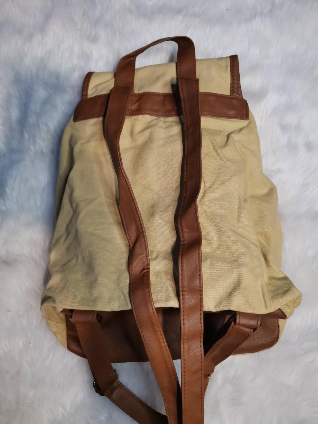 Atmosphere bag (Category: Backpacks) located in Quezon City. Submitted by drivenvf (Listing ID 1051359694, Image 3). Description: preloved and in good condition shipping at buyers expense.