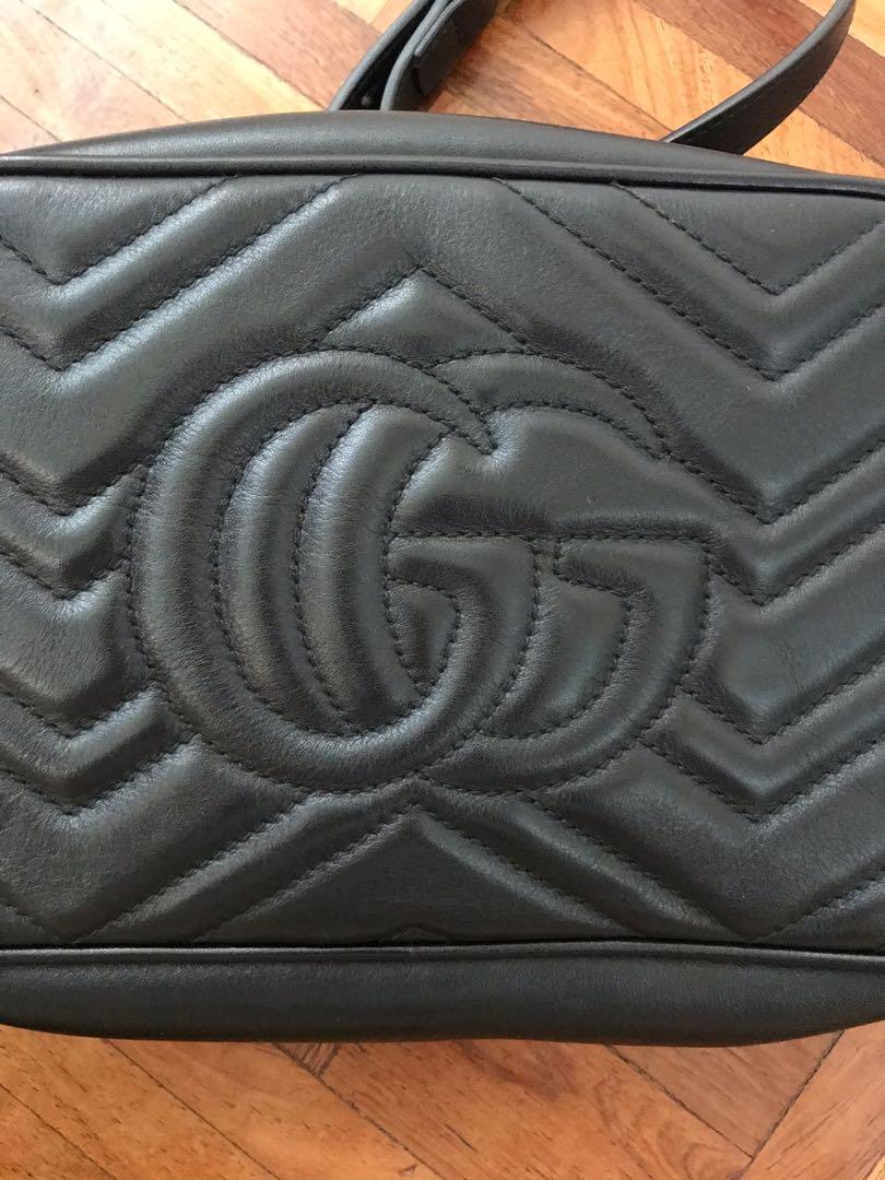 Gucci Marmont small camera bag (Category: Luxury Bags & Wallets) located in Paranaque City. Submitted by superpeanut (Listing ID 1051248420, Image 3). Description: Gucci Marmont camera bag in small 9.5 x 5 x 3 inches Black leather, gold hardware, beige suede inner lining. Used gently. No scratches, no rubmarks, no stains. Authentic, bought in Italy. With cards, dustbag and box. Clean inside and out. BPI deposit LBC or JRS.
