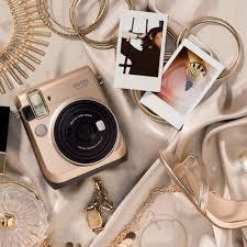Instax Mini 70 (Category: Cameras) located in Singapore. Submitted by blankblank123 (Listing ID 1051237440, Image 1). Description: Almost good as new. No scratches. Condition 10/10. Pm for more details..