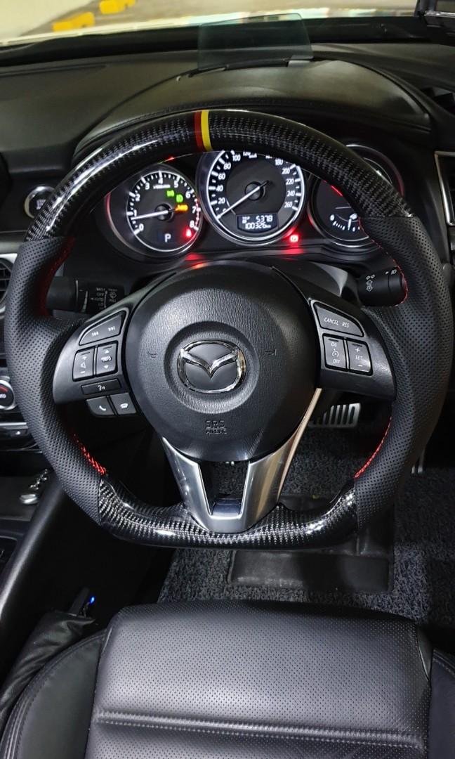 Mazda carbon fibre steering wheel. Mazda 3 Mazda 6 etc, Car Accessories