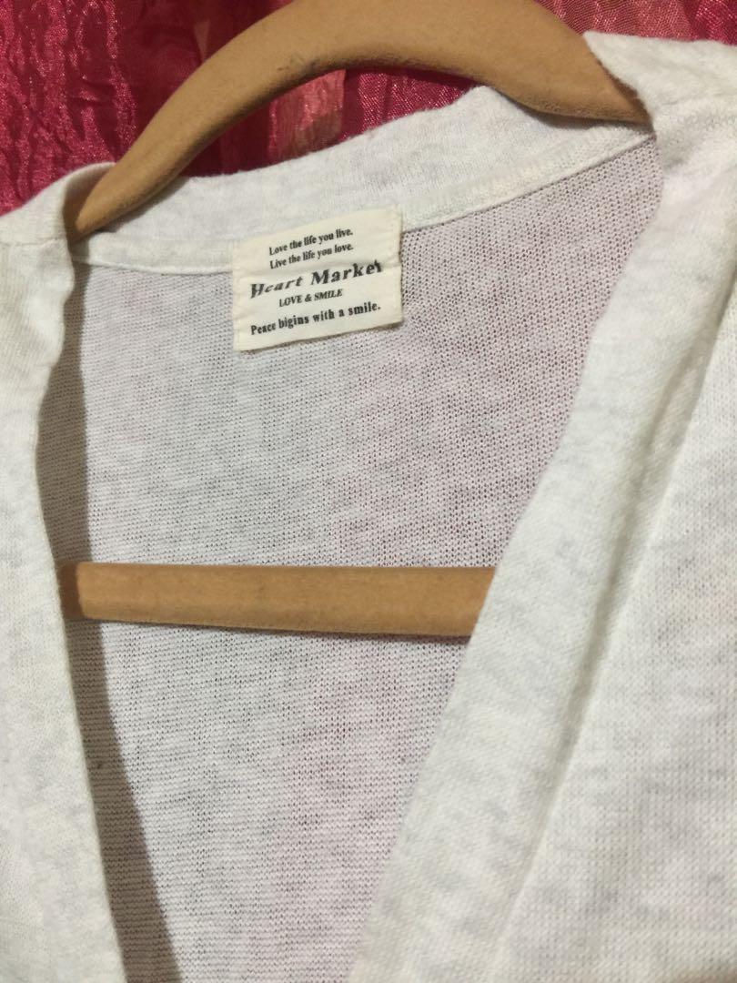 White cardigan (Category: Dresses) located in Caloocan City. Submitted by xtine01 (Listing ID 1051265181, Image 2). Description: Knit cotton cardigan fit small to medium.